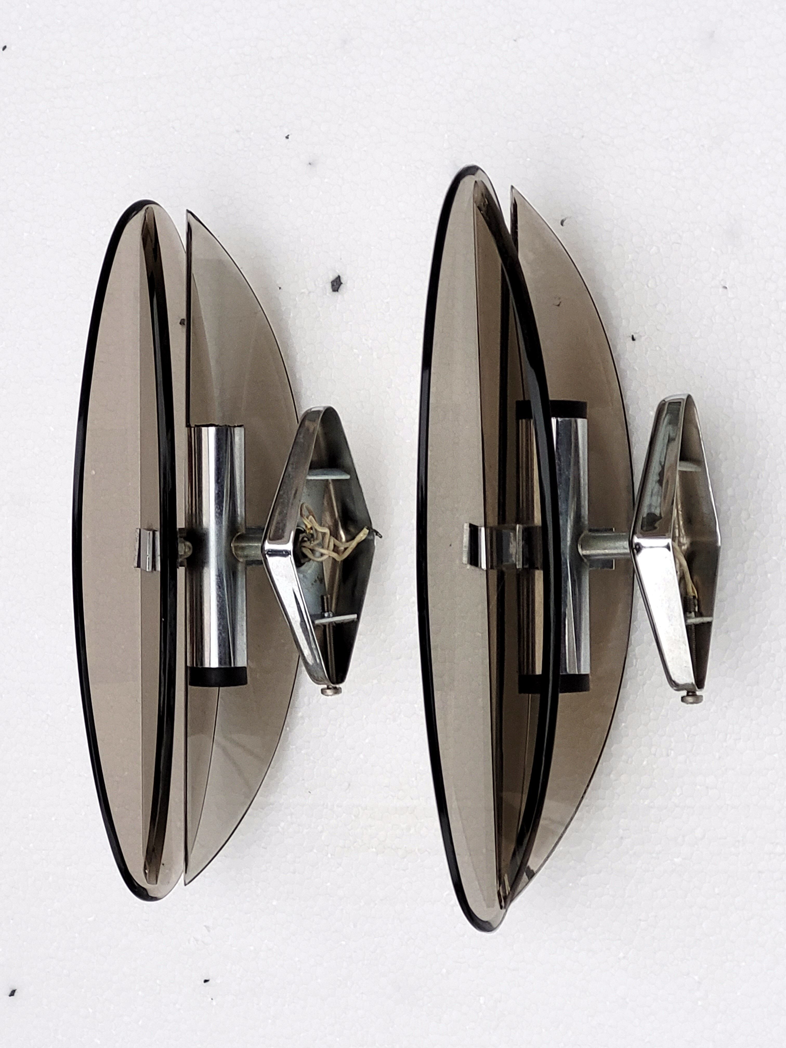 Pair of elliptical italian wall lamps in smoked glass and chrome veca