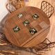 Round dining table Audoux Minet with 4 chairs and 2 armchairs.