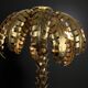 Gold metal palm lamp with glass plate base in 70s style