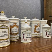 Set of 8 Paris porcelain pharmacy jars with white background with gilding