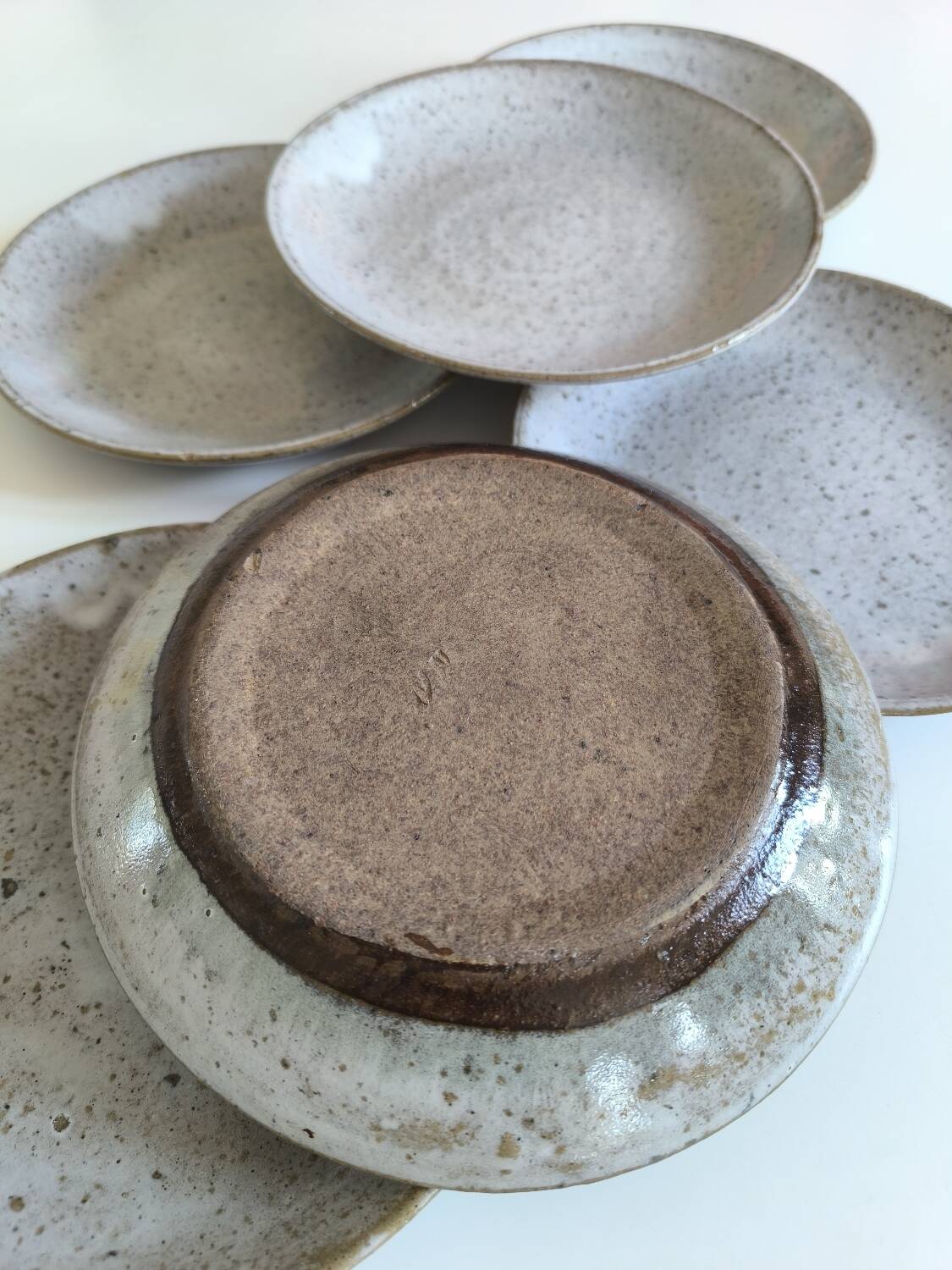 Set of six glazed stoneware plates