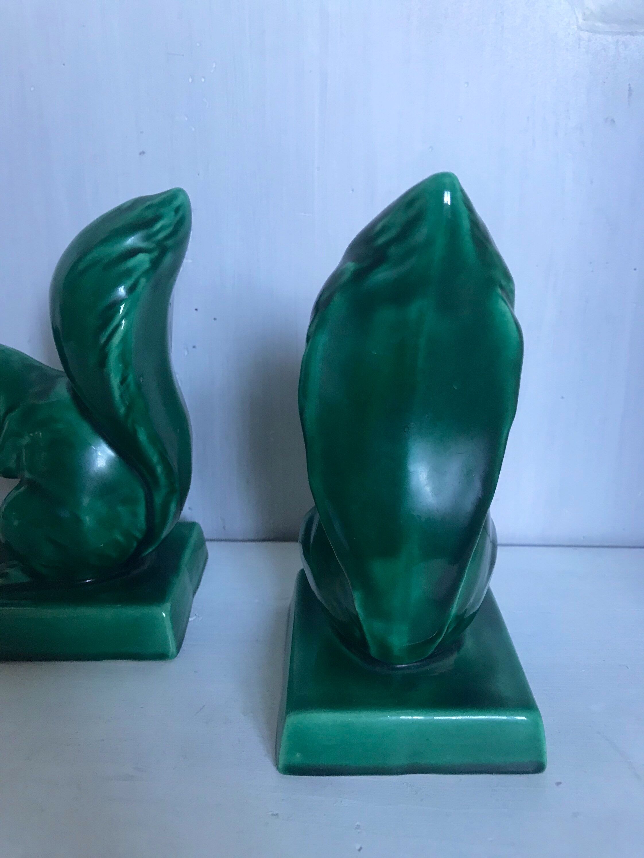 Pair of Art Deco ceramic book clamts