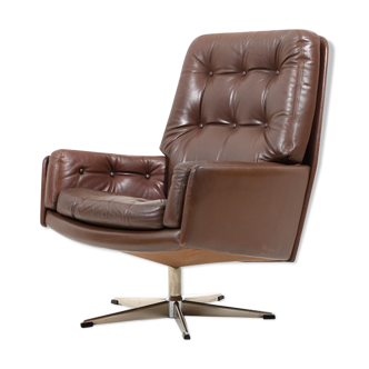 Danish swivel lounge chair in brown leather