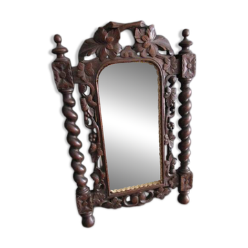 Miroir ancien en bois sculpté