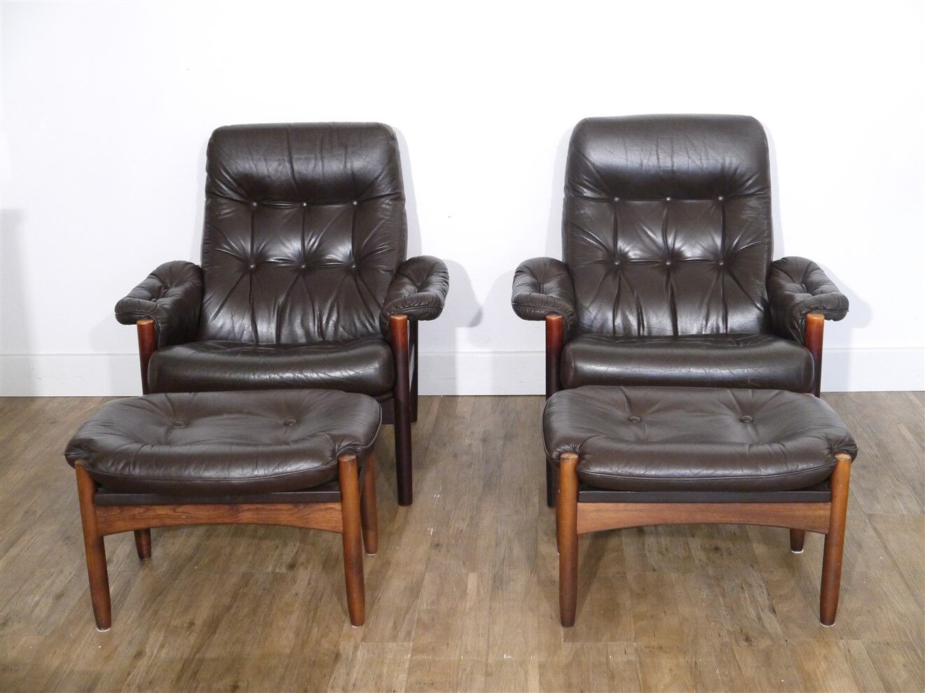 Pair of Scandinavian leather armchairs with ottomans 1970