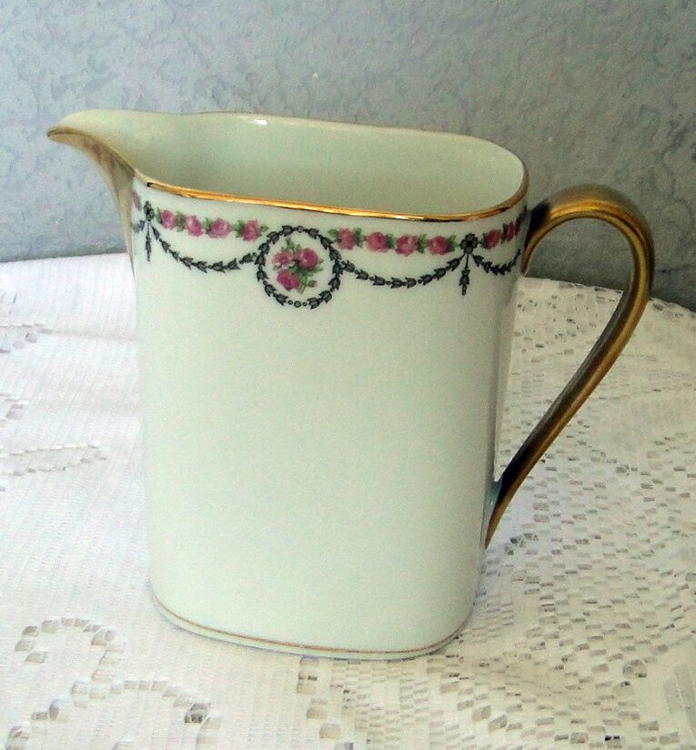 Porcelain milk pot limoges blanche liseret beak and handle dores and garland pink