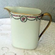 Porcelain milk pot limoges blanche liseret beak and handle dores and garland pink
