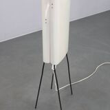 Mid-century modern floor lamp on iron legs with plastic shade and wood accent