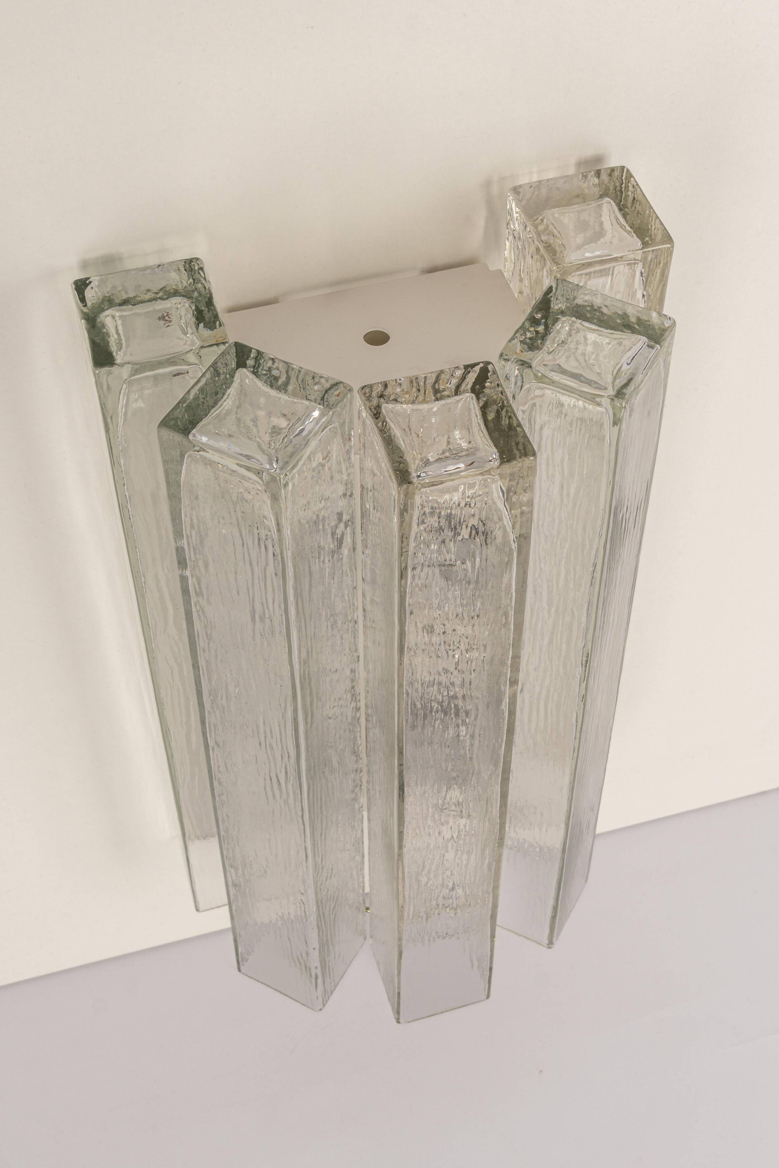 Large pair of wall sconces in brass and Murano glass by Doria, Germany, 1960s.