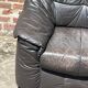 Pair of patinated leather club armchairs