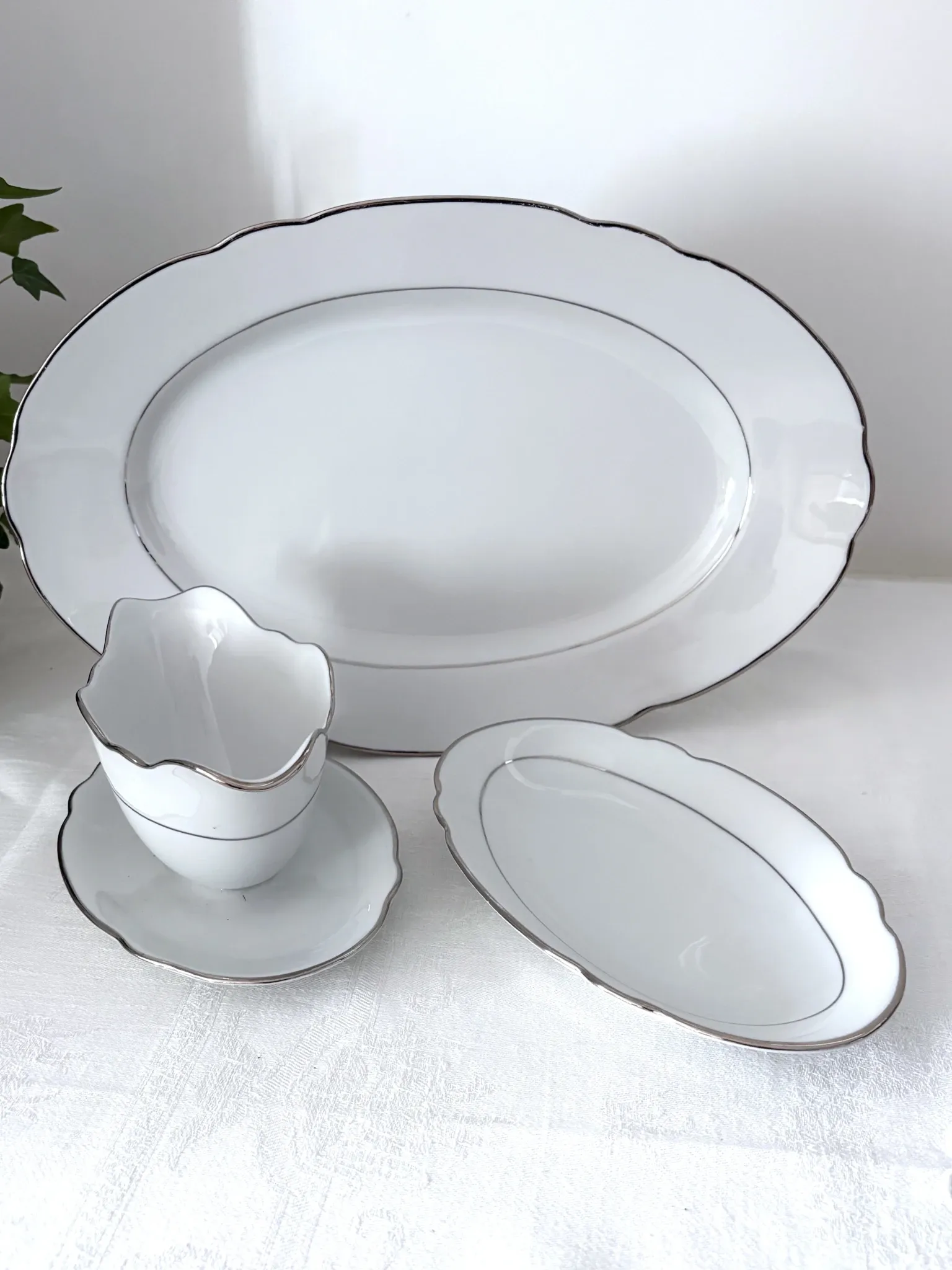 3 white porcelain plates
