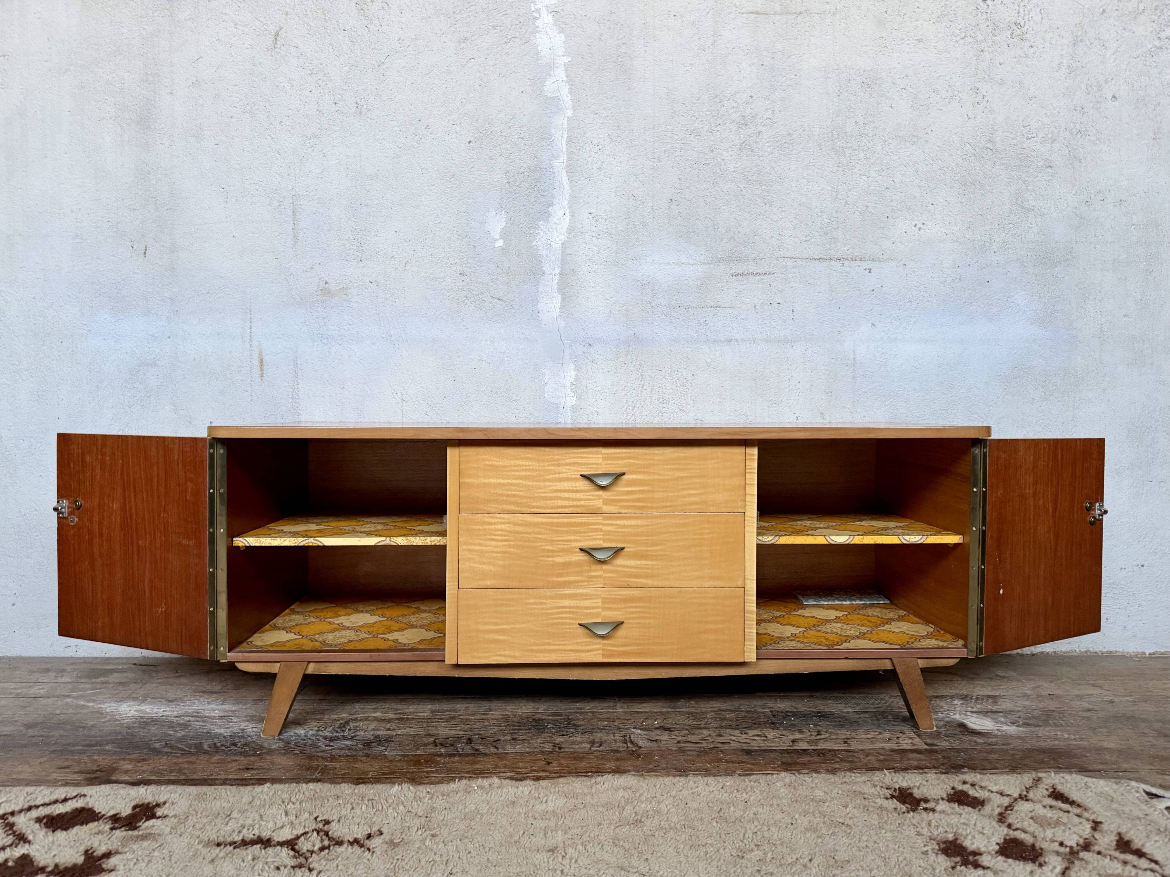 Vintage TV unit with tapered legs in Scandinavian style.
