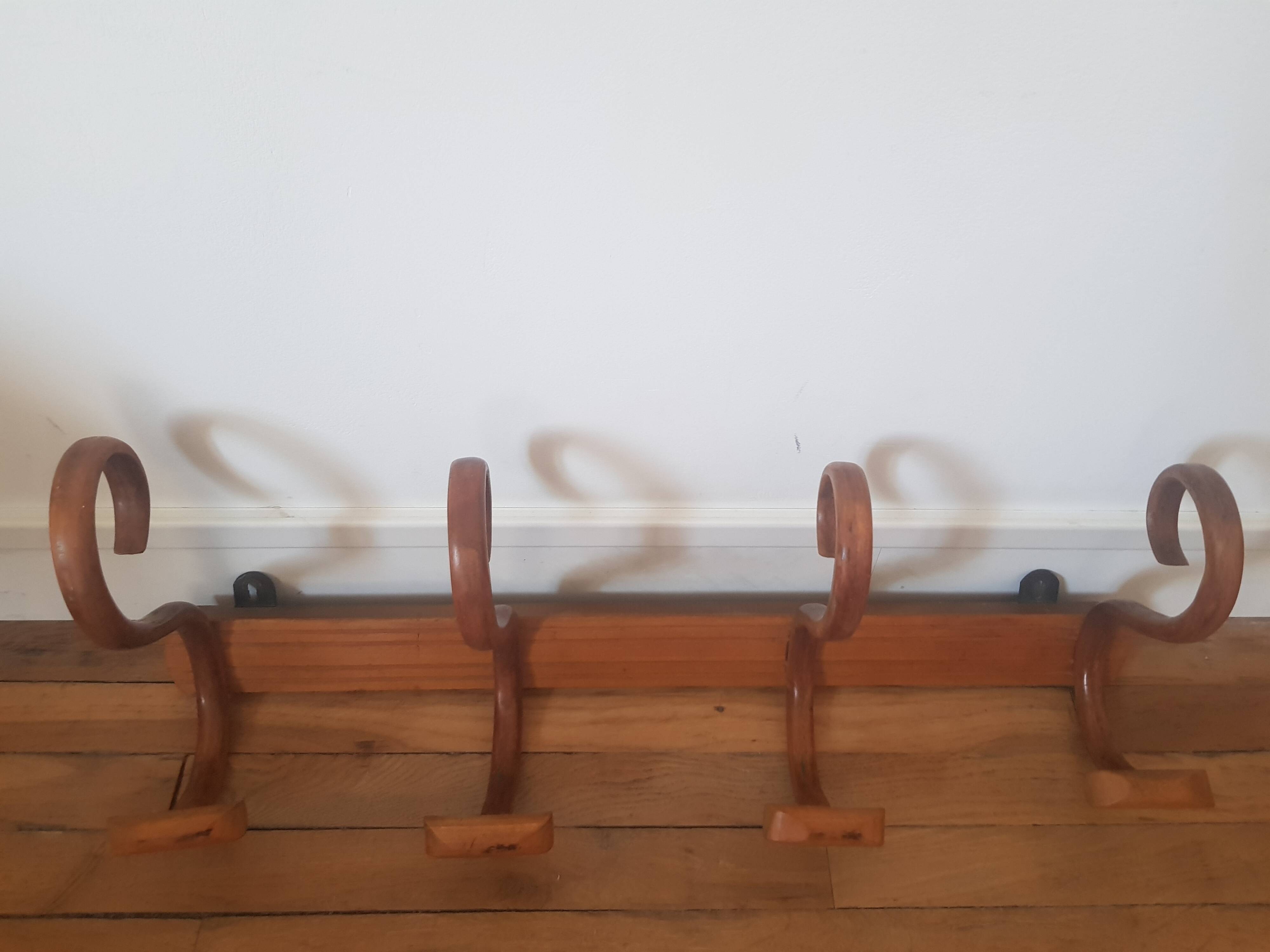 Wooden wall coat rack