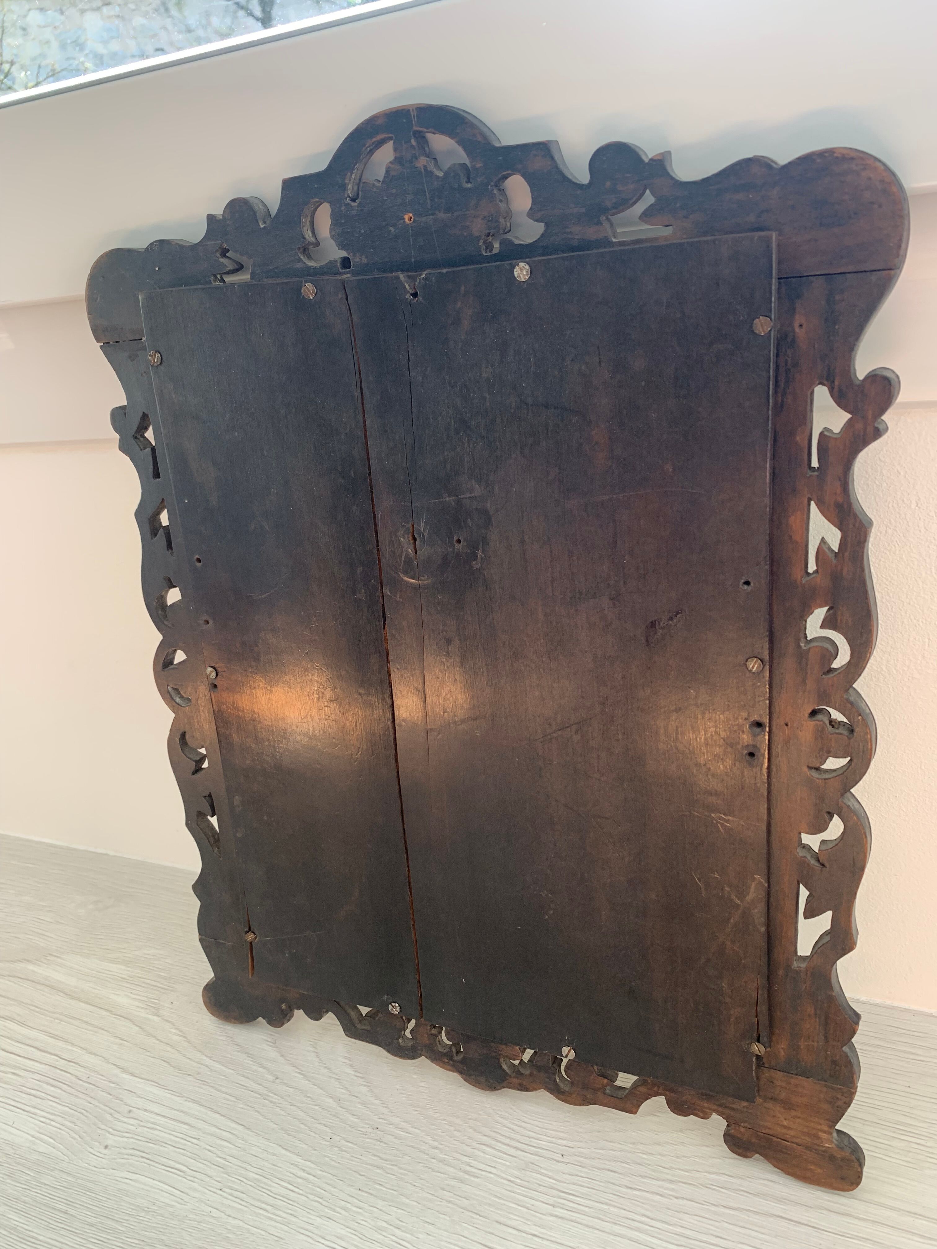 Eventful beveled mirror and openwork period 1900 repelled tin decoration