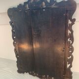 Eventful beveled mirror and openwork period 1900 repelled tin decoration