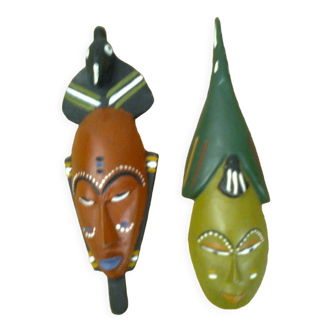2 painted wooden masks, height 20 cm