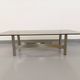 Vintage coffee table in smoked glass and brushed cast aluminum from the 70s