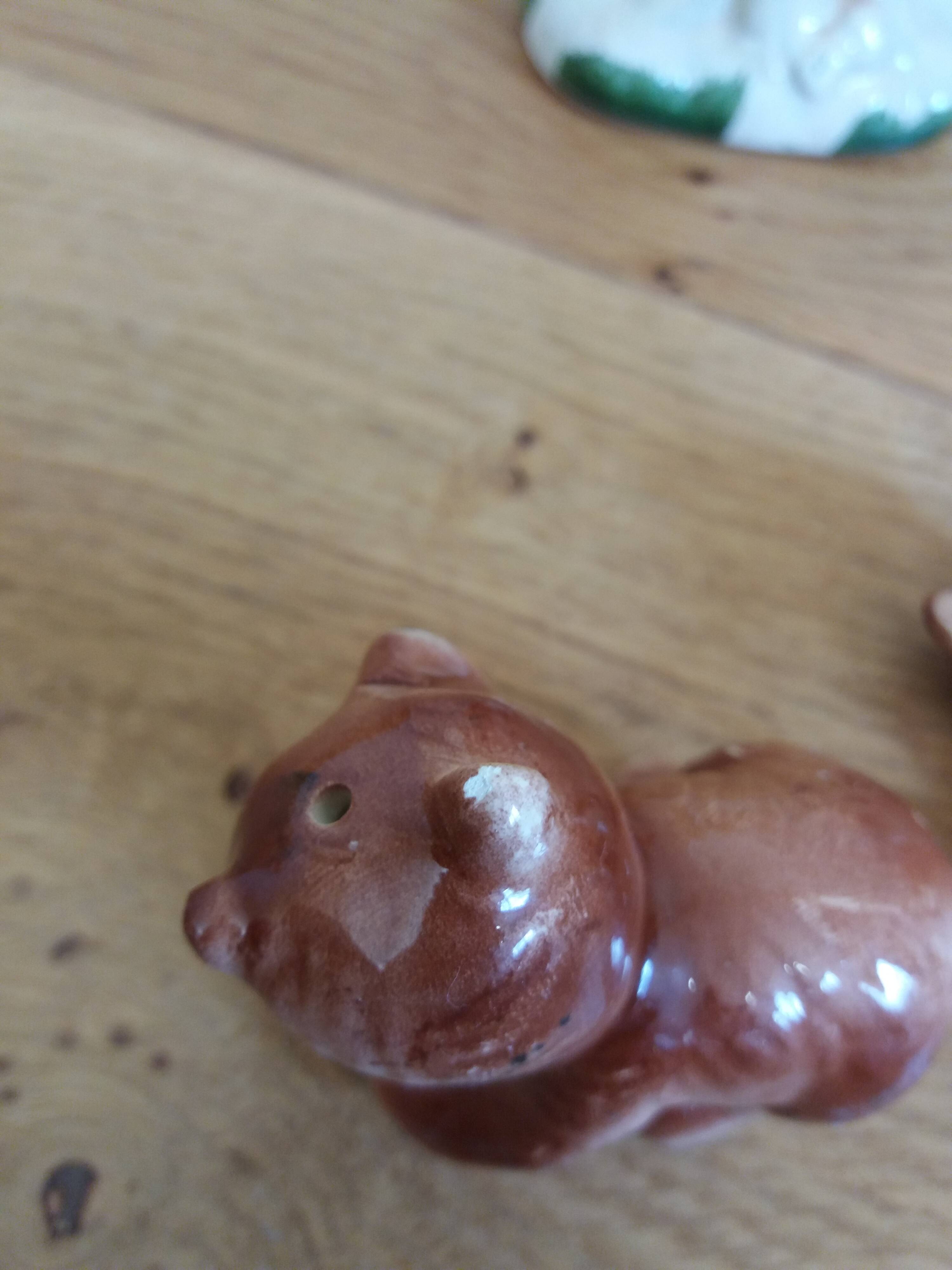Zoomorphic salt and pepper shaker bears in slip