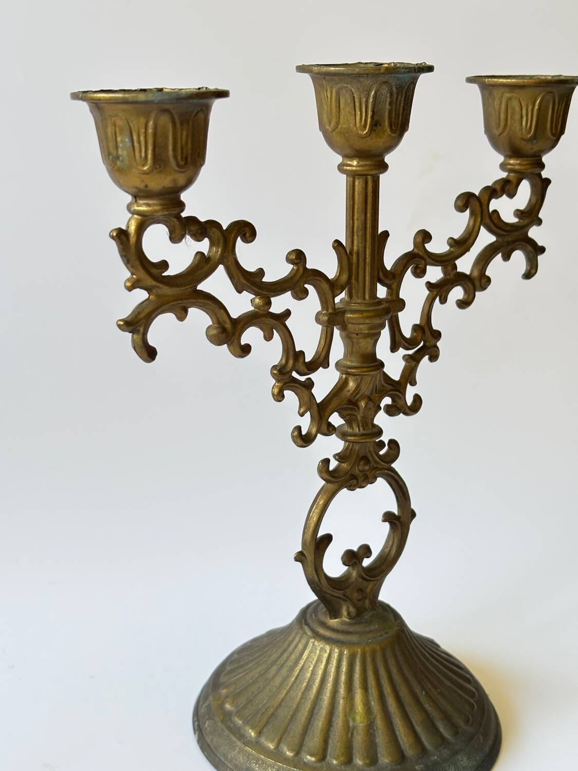 Pair of baroque style brass candlesticks