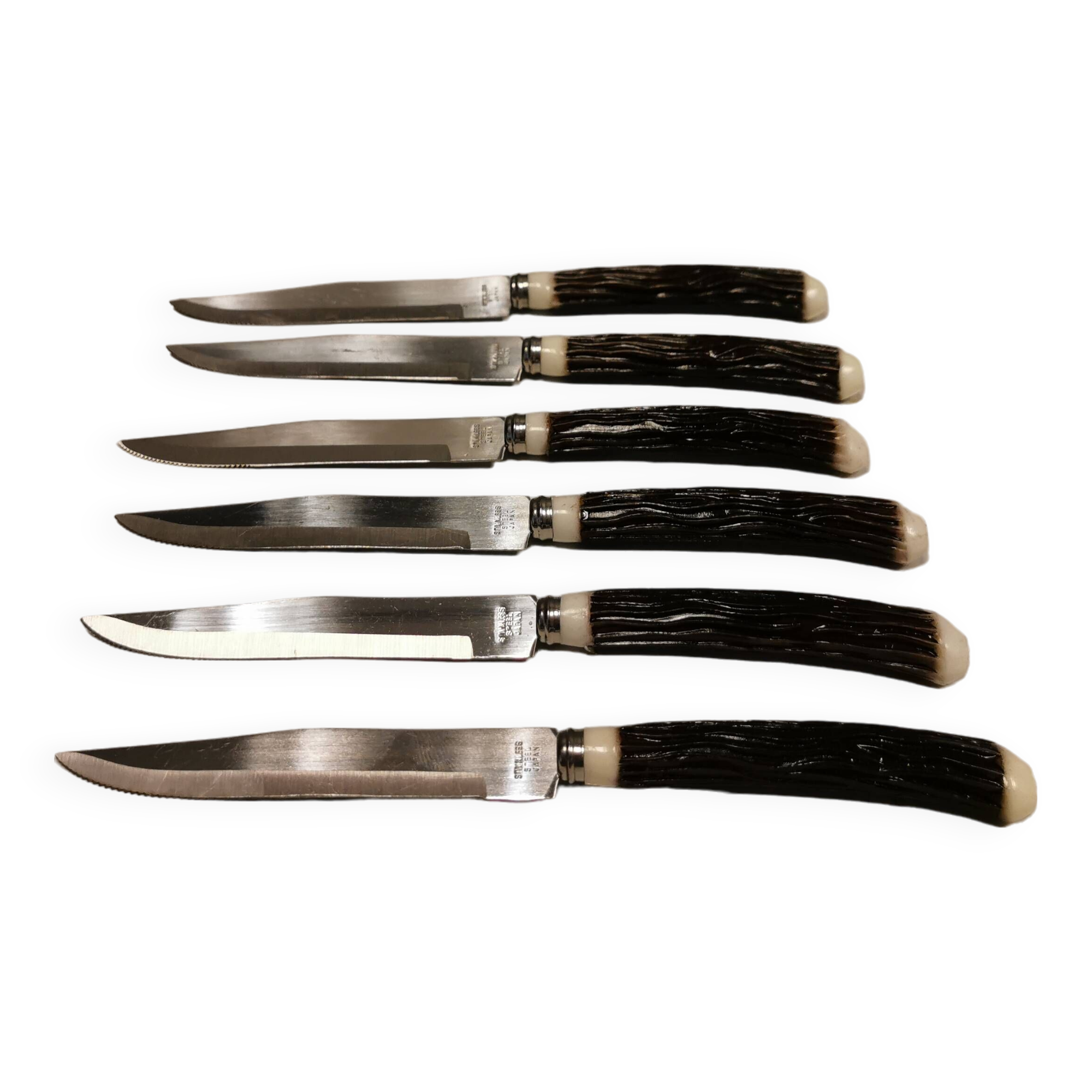 Six delicious stainless steel steak knives with bone handles, from Japan