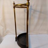 Victorian style half-moon umbrella stand in brass and cast iron