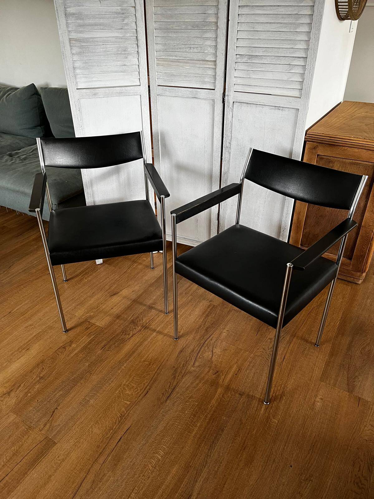 Pair of vintage leather and chrome armchairs