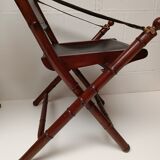Pair of vintage "safari" folding armchairs in mahogany and leather