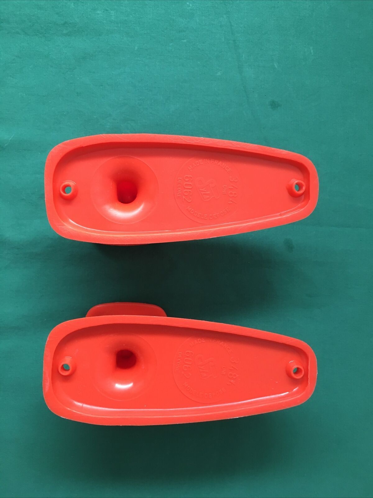 Pair of Patère coat rack Syla France plastic orange design 70s