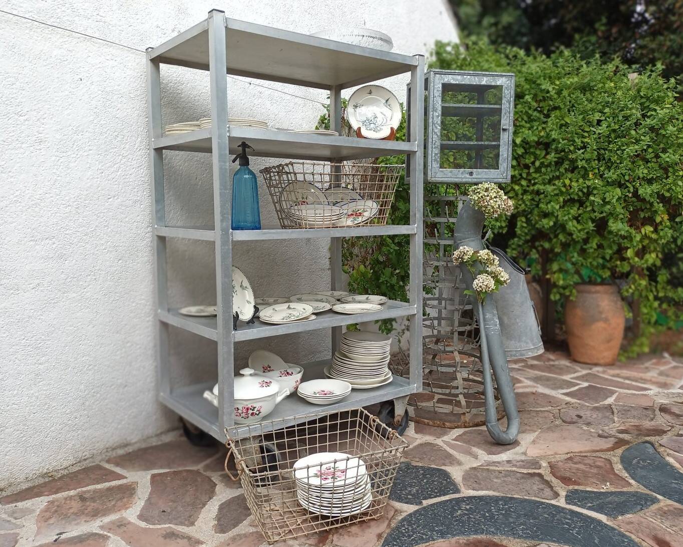 1950s metal shelf on wheels