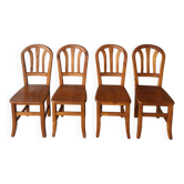 Suite de 4 chaises Vintage en bois massif