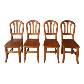 Suite de 4 chaises Vintage en bois massif