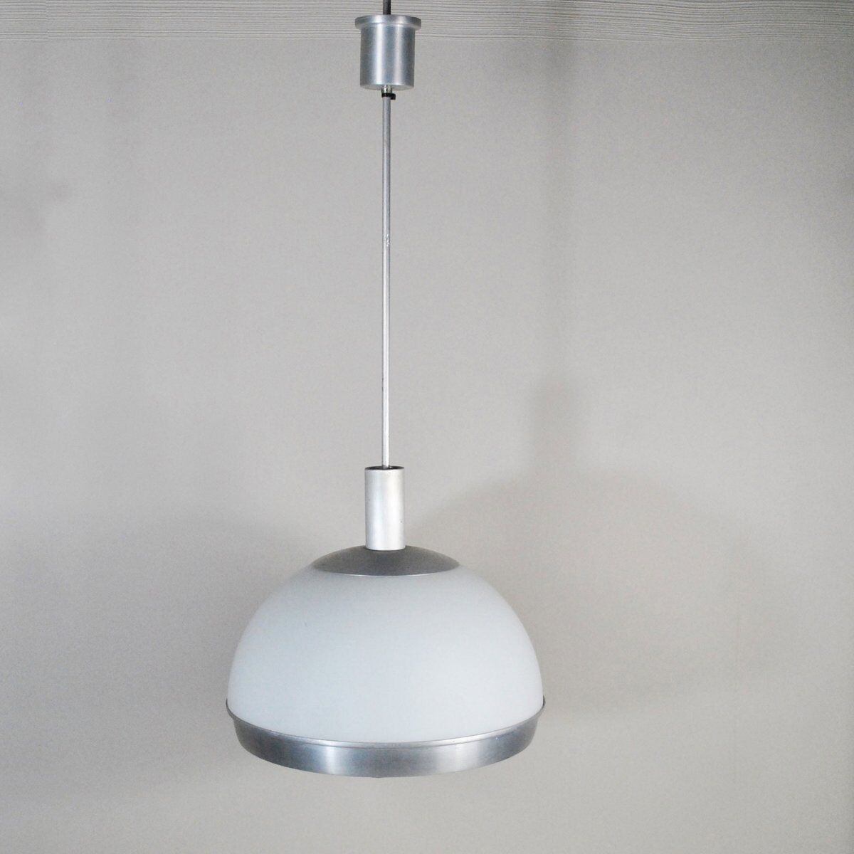 Suspended lamp in plexiglass and steel with faceted glass light by Pia Guidetti Crippa, 1960s.