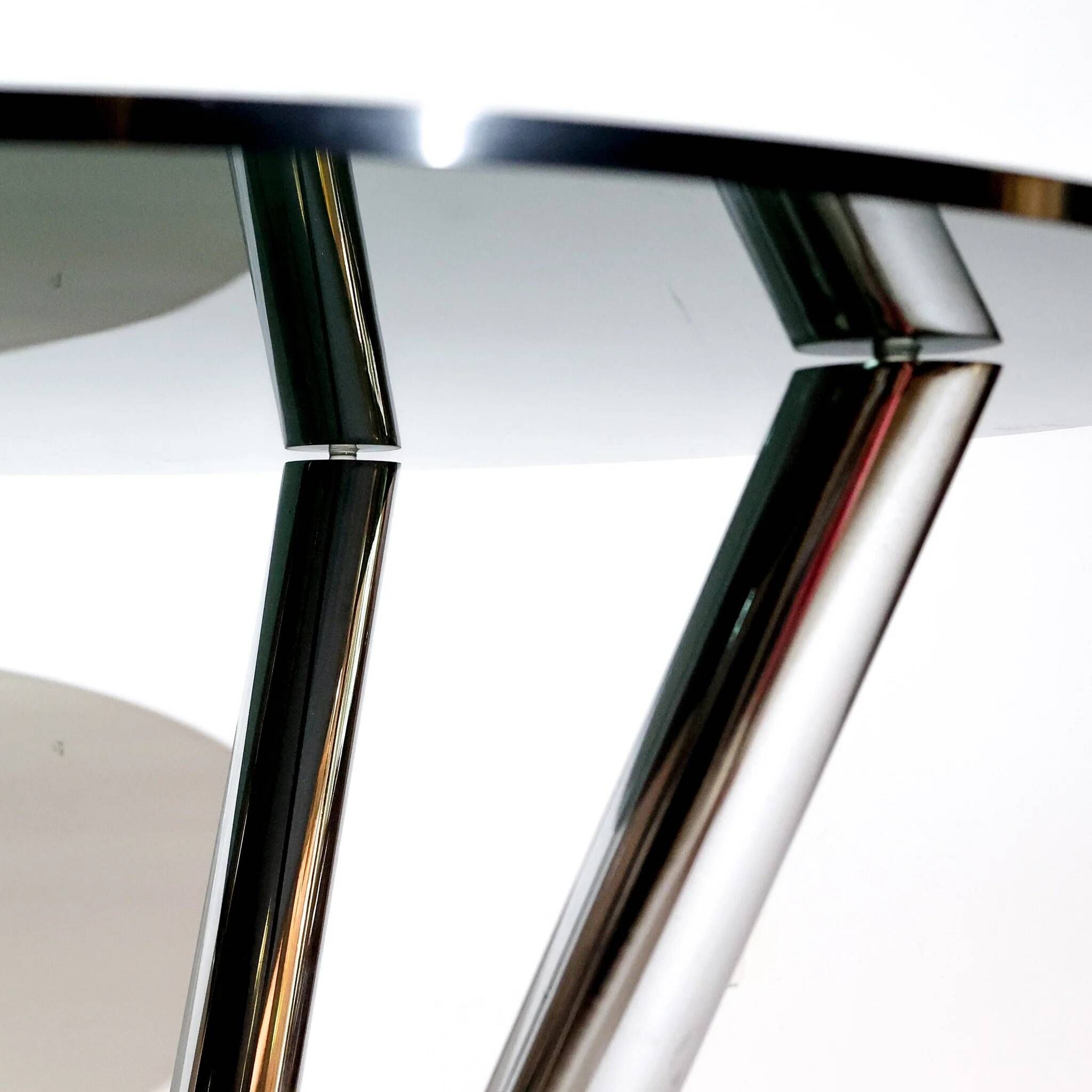 Vintage round dining table by Carlo Bartoli, smoked glass and polished chrome, Italy, 1970s.