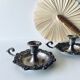 Pair of silver metal candlesticks