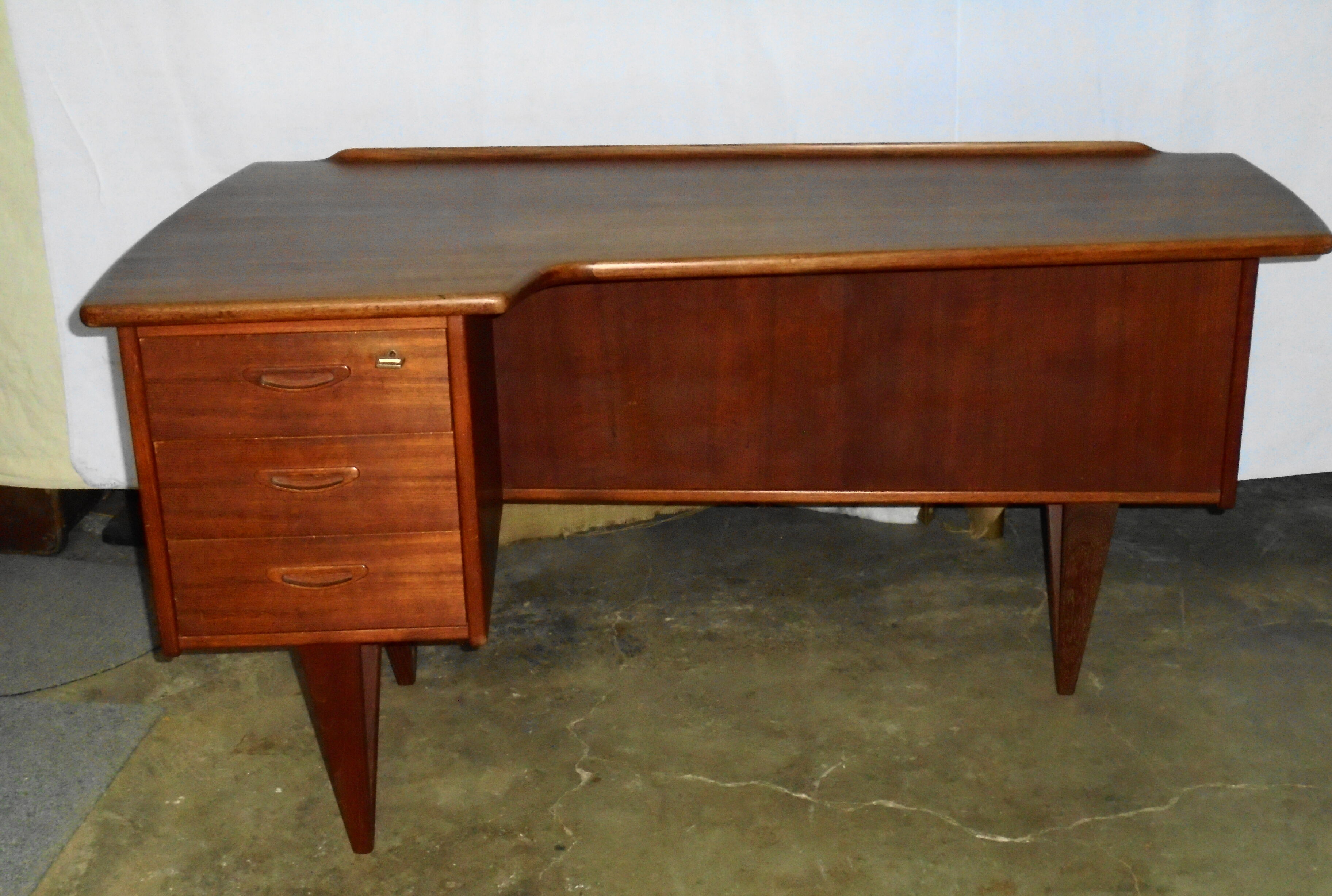 Peter Lovig Nielsen's Scandinavian teak boomerang desk from the 60s