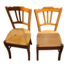 Paire de chaises de bistrot en bois paillées
