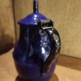 Small vintage French jug with lid, in blue enamel