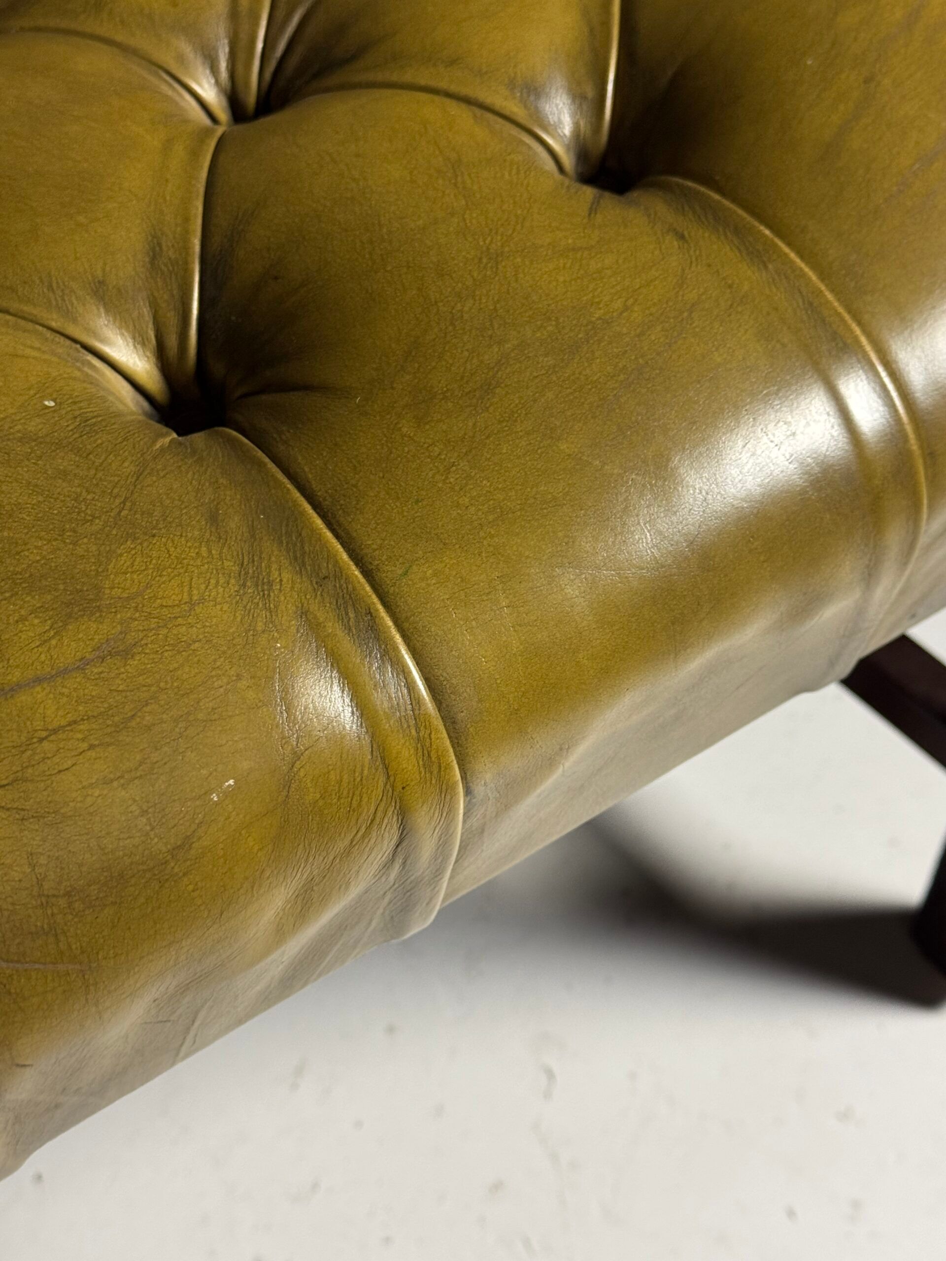 Green leather tufted office chair
