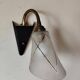 1950s wall lamp, metal, flexible brass stem and opaque shade.