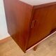 Scandinavian teak sideboard, 230 cm long, with 3 doors and 4 drawers.