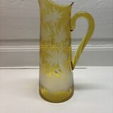 Decorated yellow glass pitcher