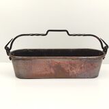 Copper planter and wrought iron handle