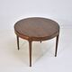 Vintage round Scandinavian table from the 60s, teak legs.