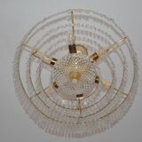 Old chandelier with tassels and brass