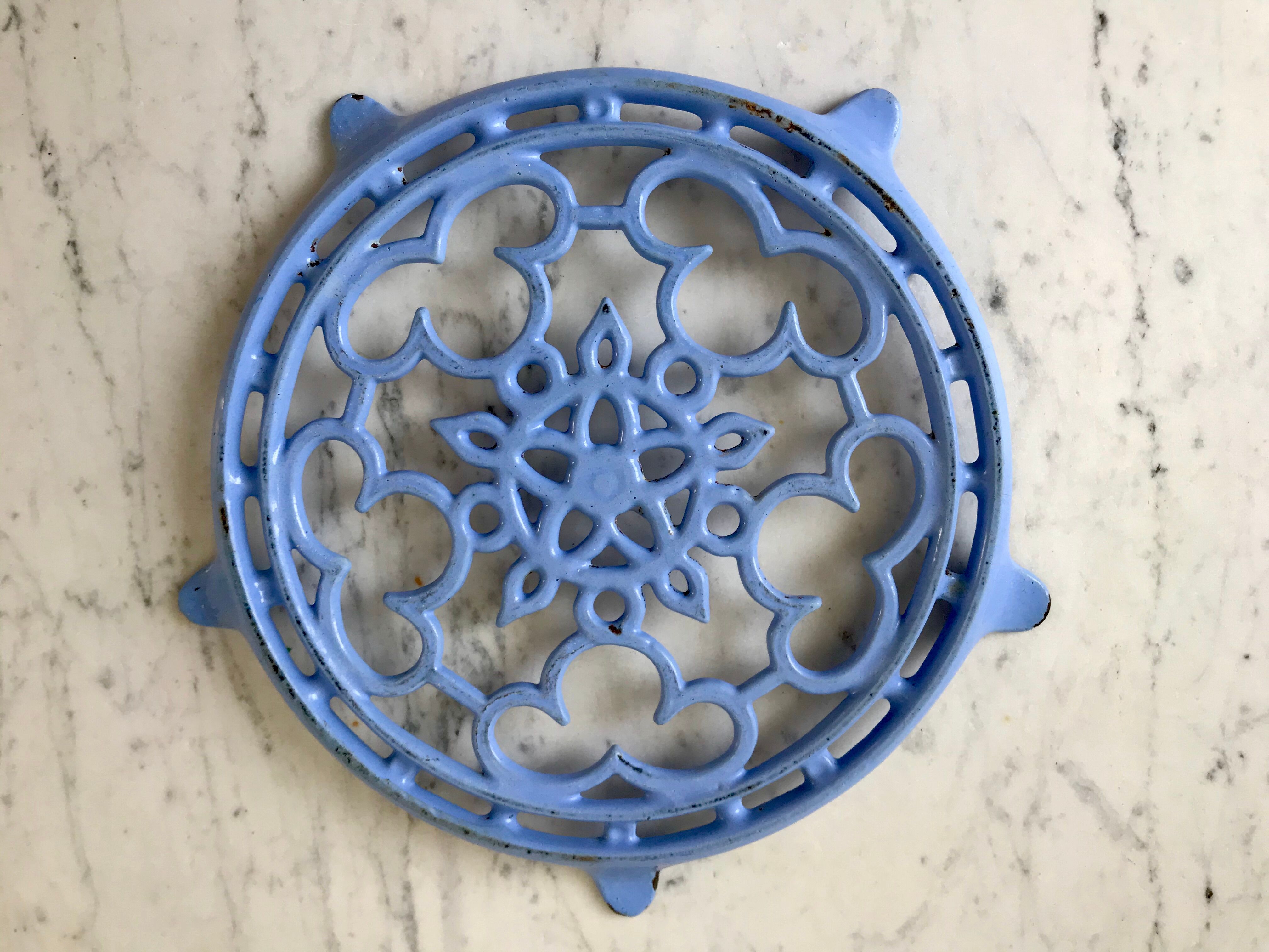 Cast iron coaster painted sky blue early twentieth century