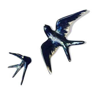 Two swallows in vintage faience