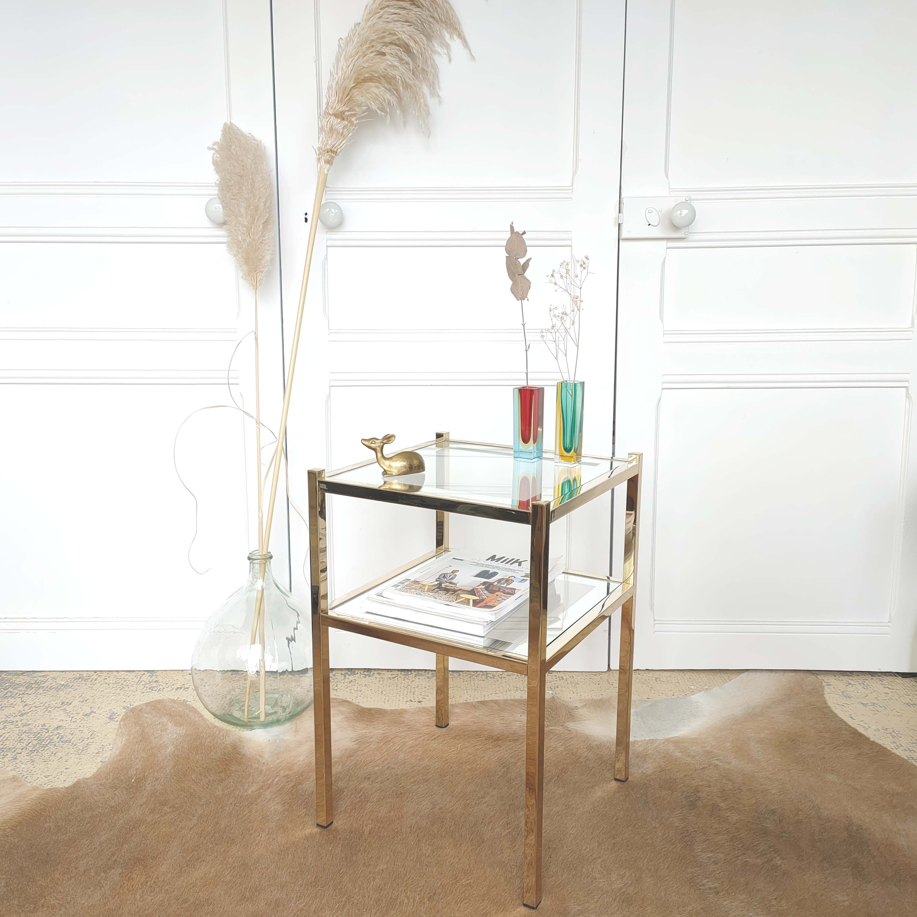 Golden sofa tip and mirror glass