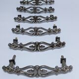 Six Huwil metal handles for neo-classical drawers from the 60s