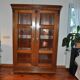Cabinet ancien en bois et verre marron - vitrine style 1900 à moulures sculptées