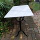 Table bistrot en marbre de carrare et fonte